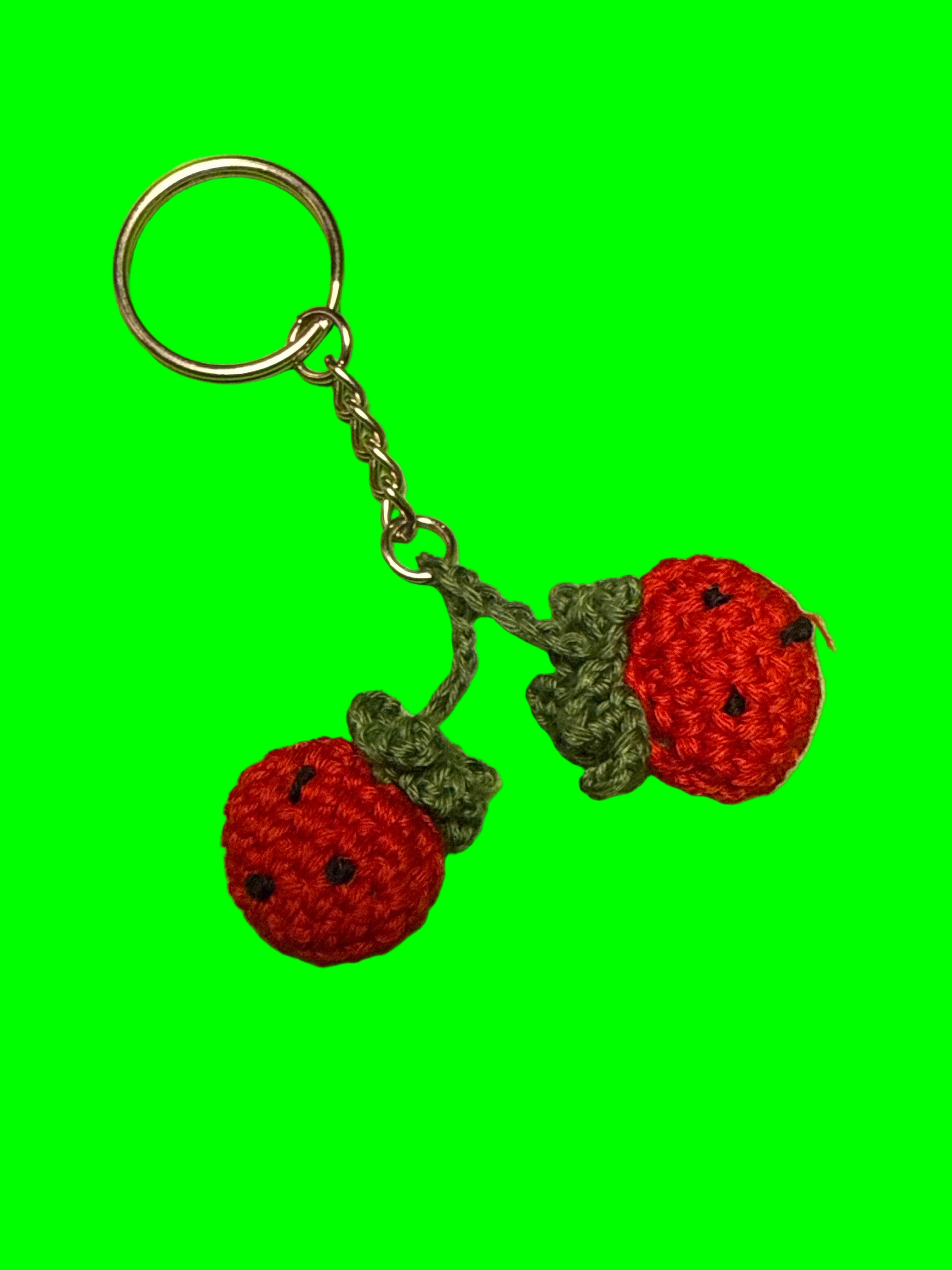 Crocheted strawberries keychain