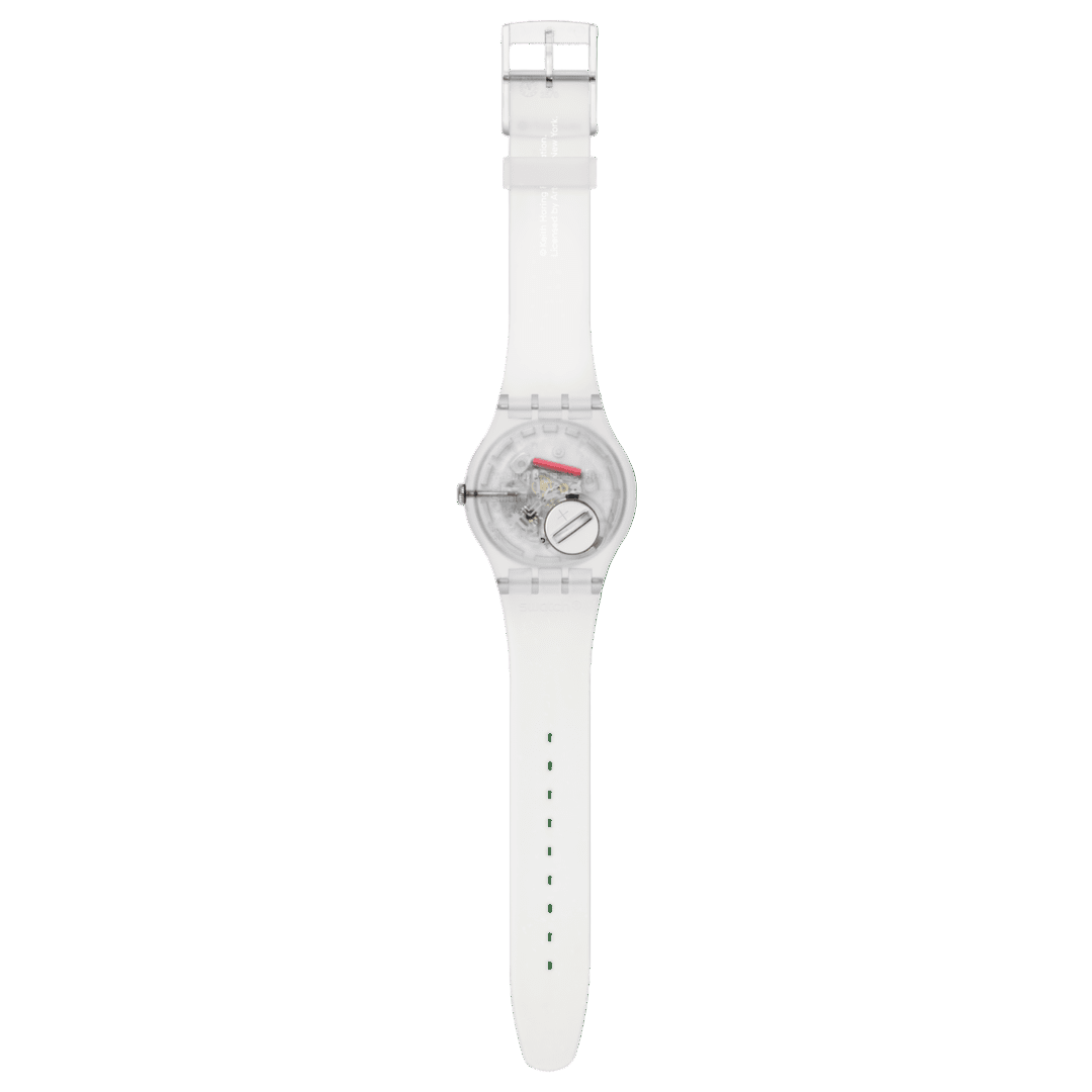Clear wristwatch with a white strap on a white background