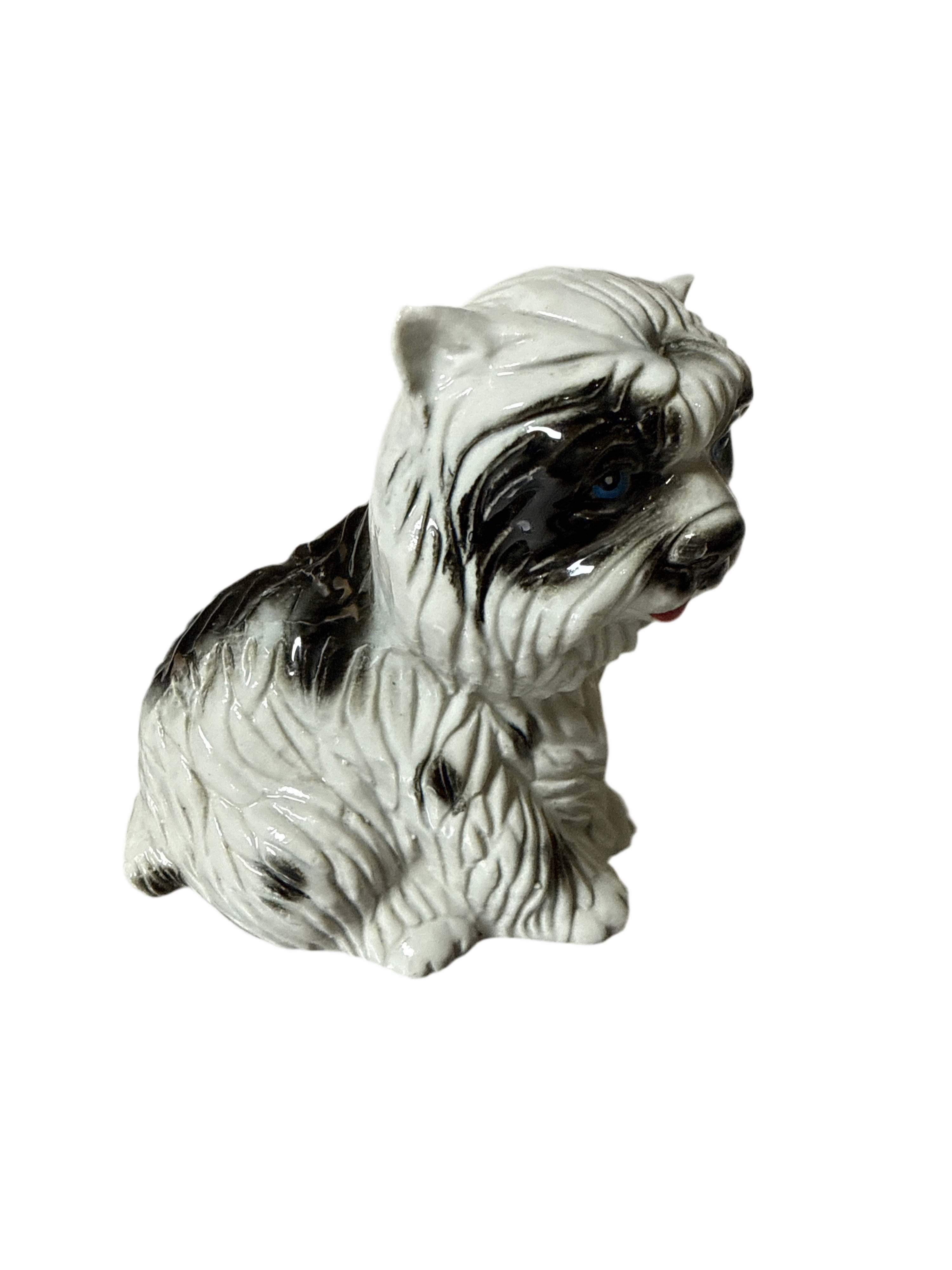 Dog figurine on a white background