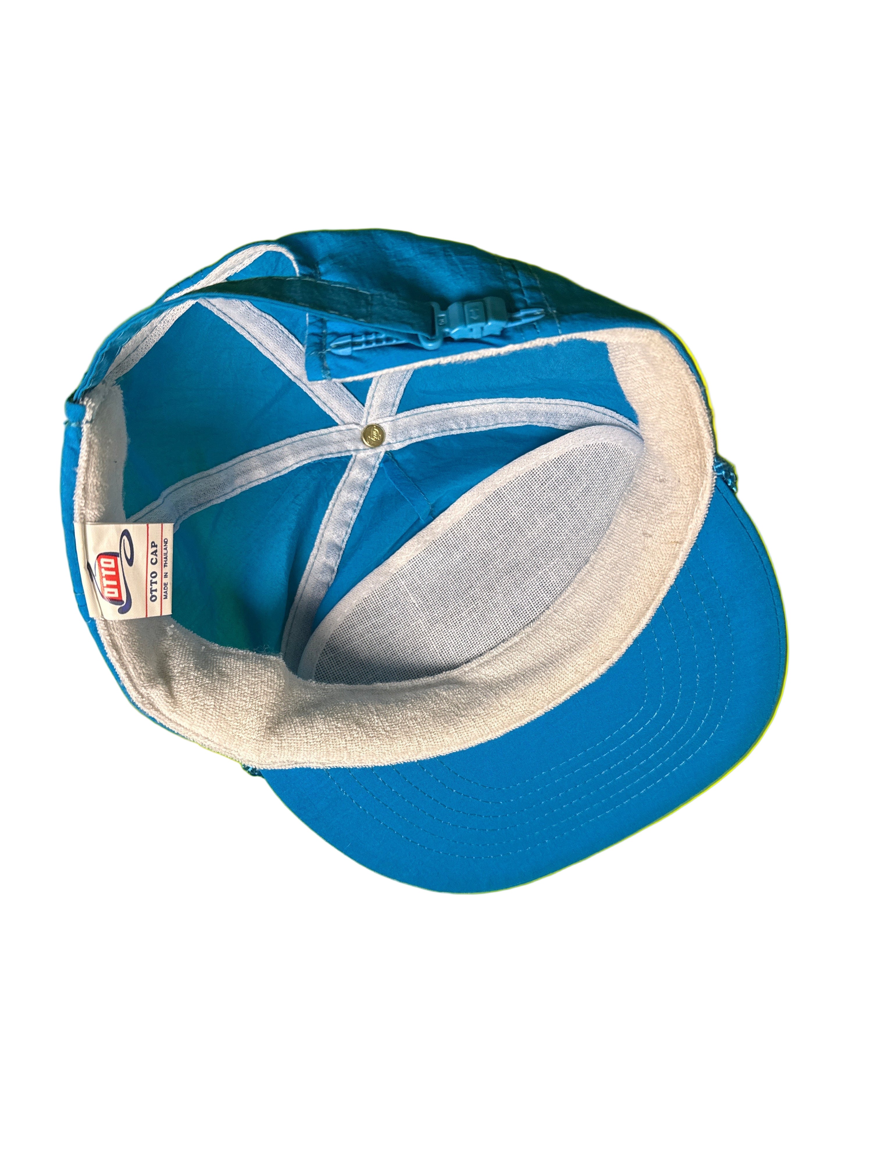 Blue cap with white interior 
