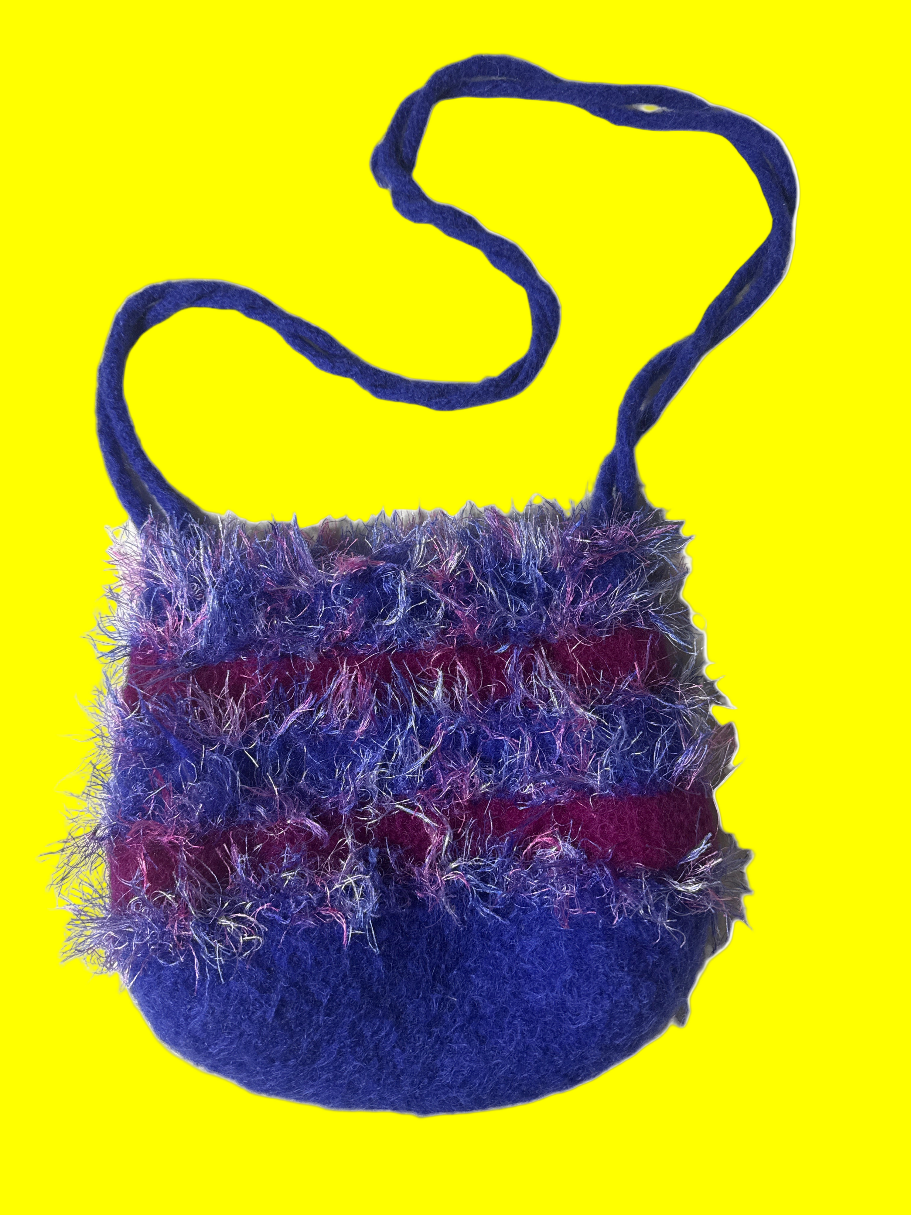 Blue and purple fluffy bag with a strap 