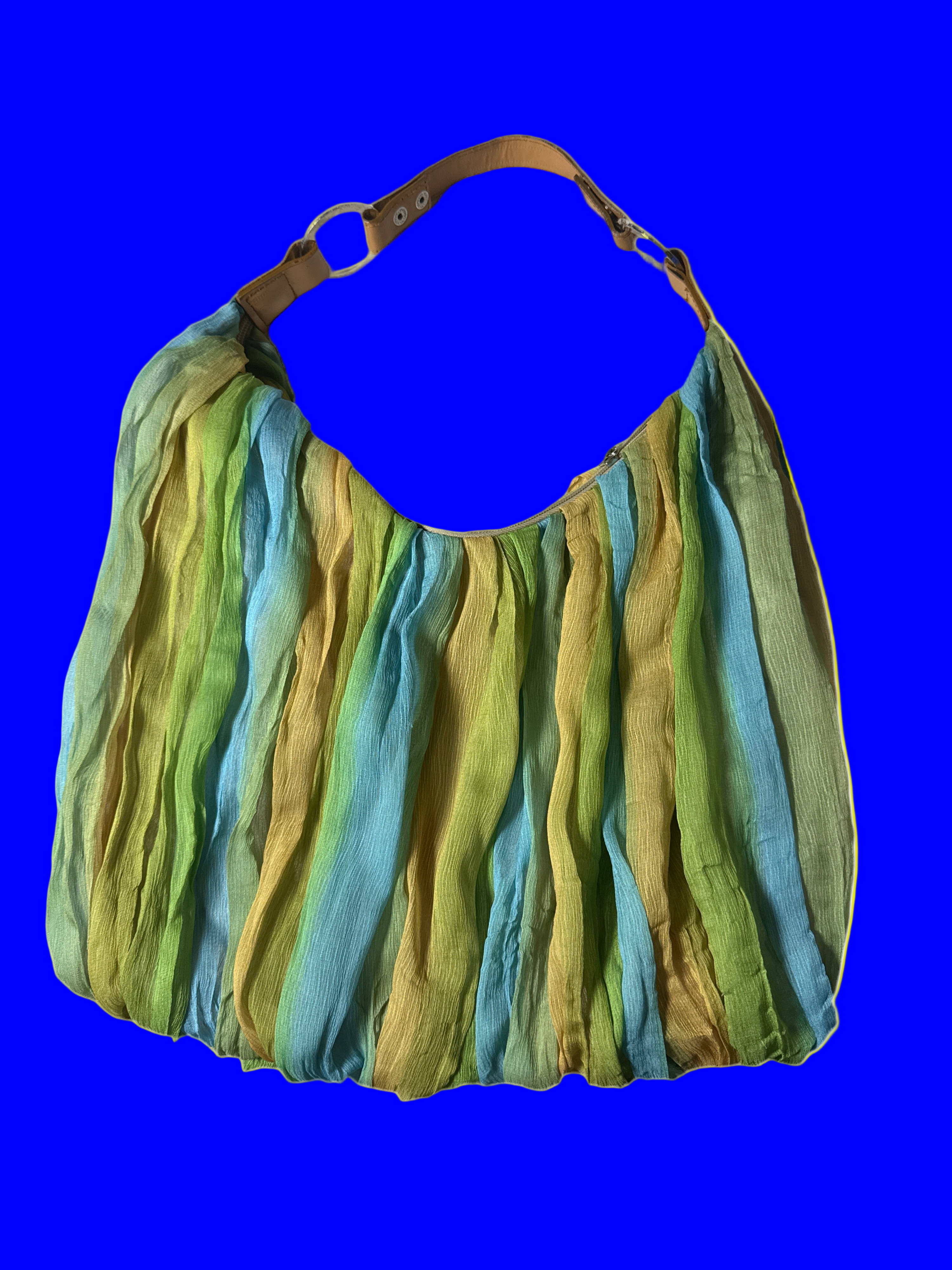 Colorful striped handbag with a brown handle 